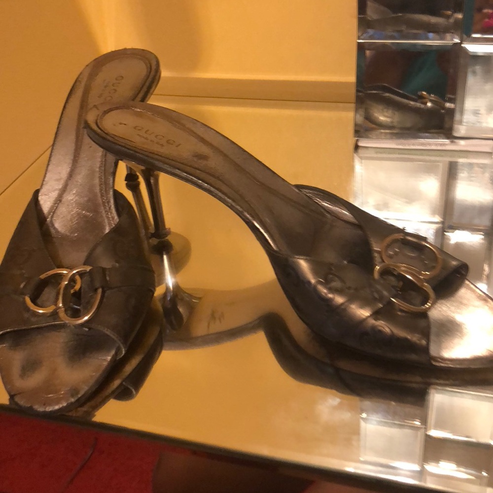 A pair of Gucci slippers